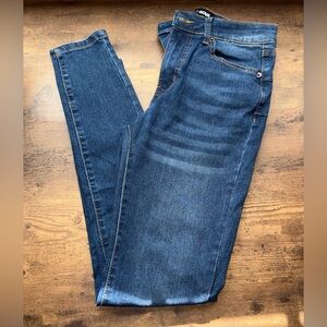 Woman’s Skinny Blue Jeans